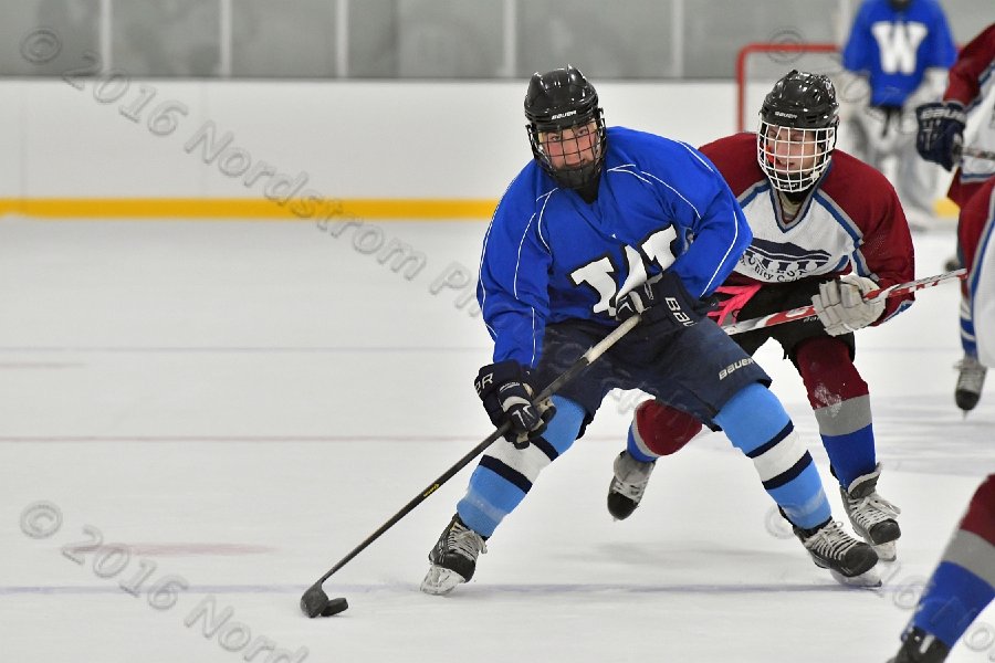 Wheaton College Men\'s Ice Hockey vs Middlesex Community College. - Photo By: KEITH NORDSTROM